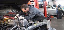 mechanic working on car